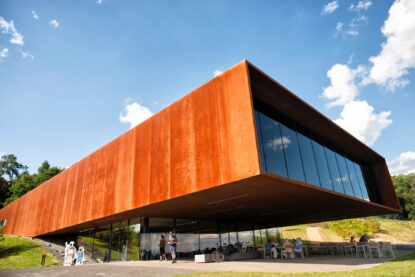 The museum and research center of the Celtic culture. The museum was opened in 2011 by the Hessen office of built heritage conservation ( Landesamt fȕr Denkmalpflege Hessen). It is located at the important place of discovery of a Celtic settlement aged about 5 thousend B.C. In the front of the building you see visitors watching and enjoing at the location.